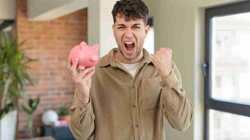 Inflation RBA target range celebration with piggy bank.